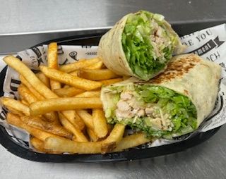 A Caesar wrap with fries