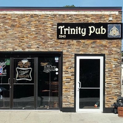 The Trinity Pub storefront and sign at 5943 N. Northwest Hwy